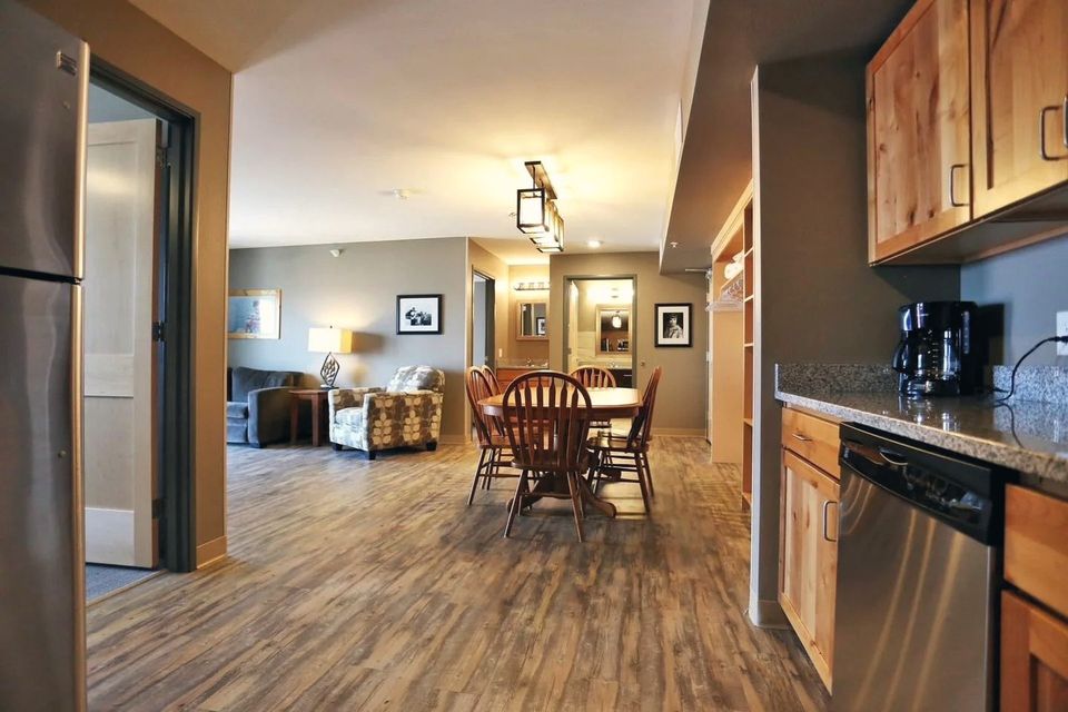 Kitchen and dining area in a Legendary Suite