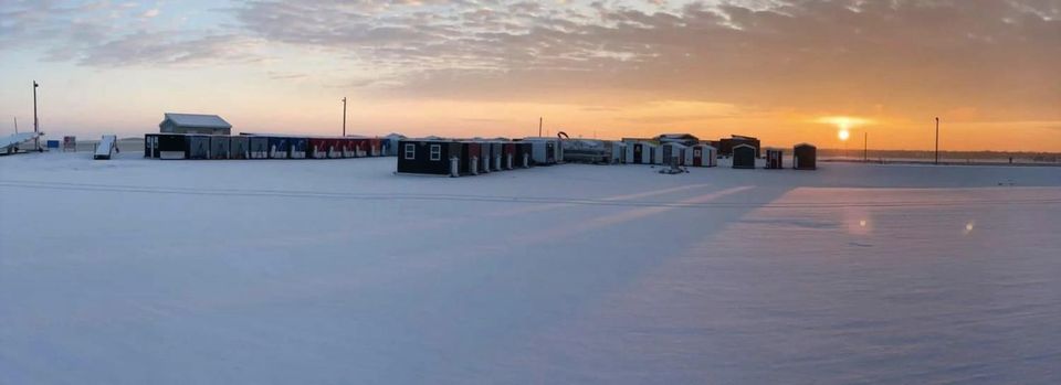 Fish house camp on the ice in front of Woodland Resort